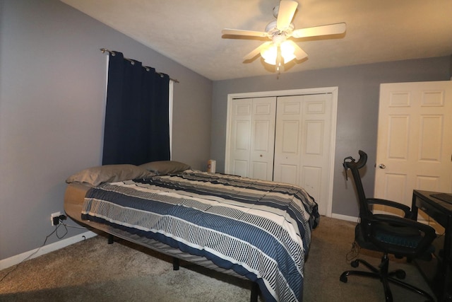 carpeted bedroom featuring a closet, baseboards, and a ceiling fan