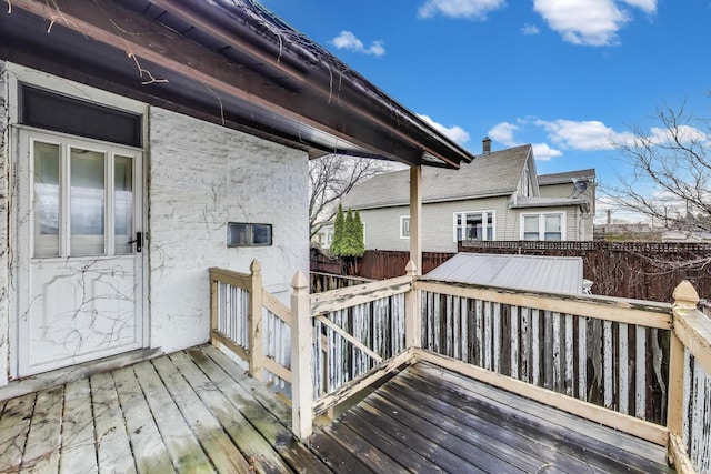 wooden deck featuring fence