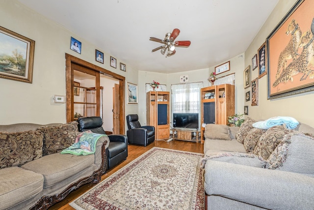 1317 N Harding Ave, Chicago, IL 60651 - living room featuring a ceiling fan and wood finished floors