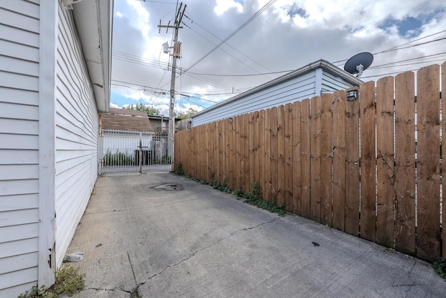 1317 N Harding Ave, Chicago, IL 60651 - view of patio with a gate and fence