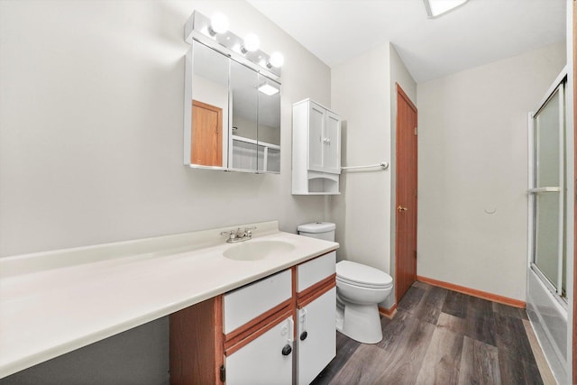 1545 W Crystal Rock Ct Unit 1B, Round Lake Beach, IL 60073 - bathroom with vanity, toilet, and wood finished floors