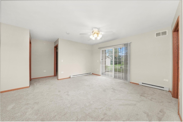 1545 W Crystal Rock Ct Unit 1B, Round Lake Beach, IL 60073 - carpeted empty room with a ceiling fan, baseboards, baseboard heating, and visible vents