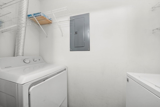 1545 W Crystal Rock Ct Unit 1B, Round Lake Beach, IL 60073 - laundry room with electric panel, laundry area, and separate washer and dryer