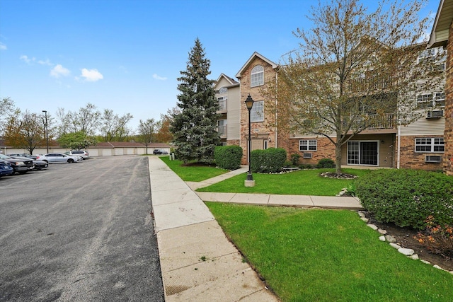 1545 W Crystal Rock Ct Unit 1B, Round Lake Beach, IL 60073 - view of road featuring street lighting and sidewalks