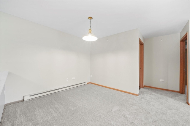 1545 W Crystal Rock Ct Unit 1B, Round Lake Beach, IL 60073 - empty room featuring light colored carpet, baseboards, and baseboard heating