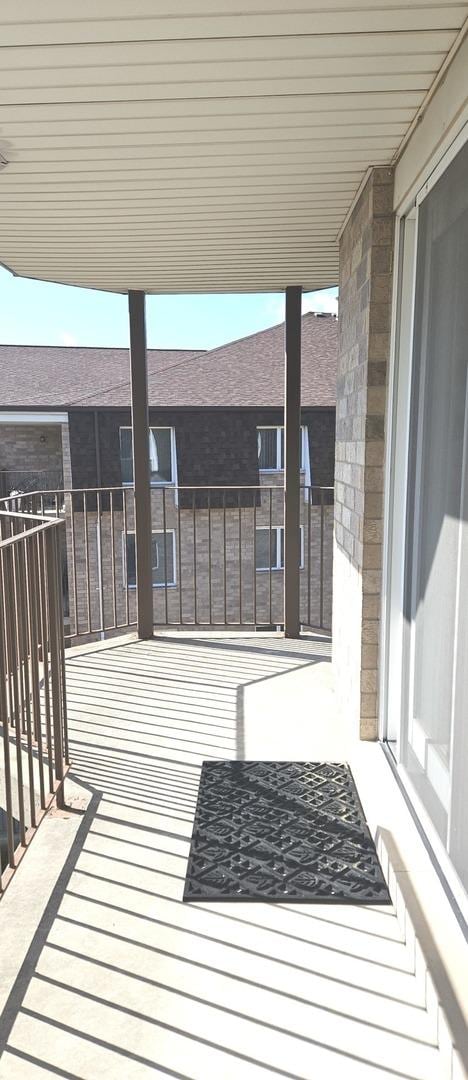 view of patio with a balcony