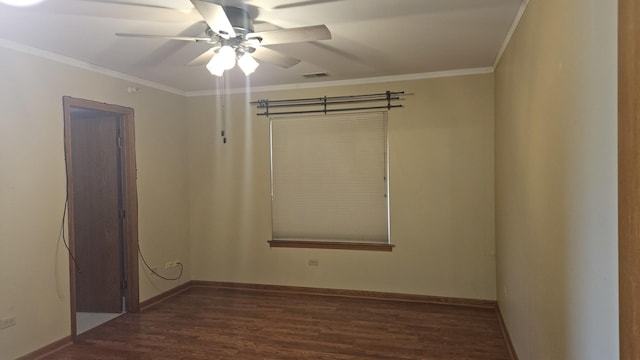 empty room with dark wood-style floors, ceiling fan, ornamental molding, and visible vents