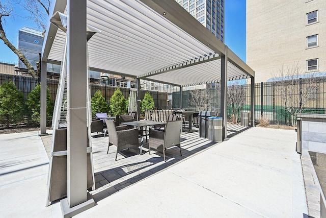 view of patio / terrace featuring a fenced backyard, outdoor dining area, and a pergola