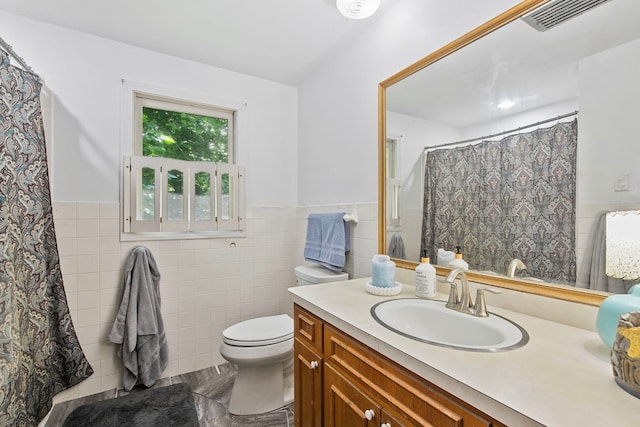 36W525 Wild Rose Rd, Saint Charles, IL 60174 - full bath featuring tile walls, vanity, toilet, a wainscoted wall, and a shower with shower curtain