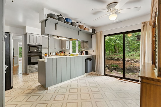 36W525 Wild Rose Rd, Saint Charles, IL 60174 - kitchen featuring black appliances, gray cabinetry, light floors, and plenty of natural light