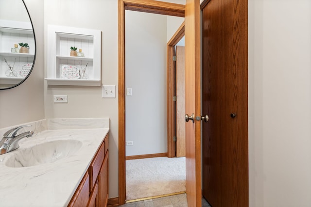 2442 Wilton Ln Unit 2442, Aurora, IL 60502 - bathroom with baseboards and vanity