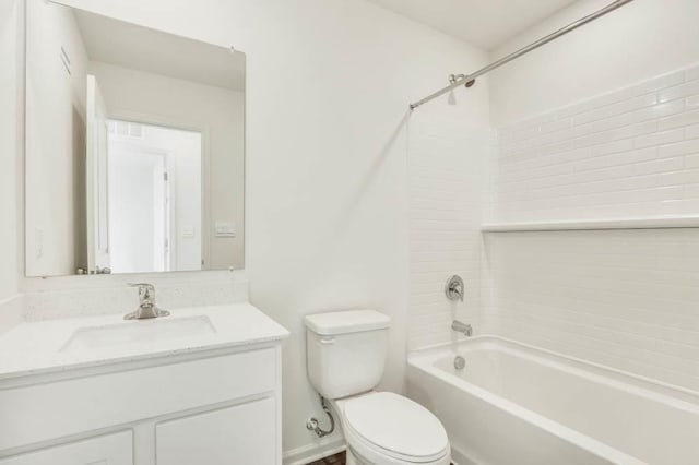bathroom with toilet, vanity, and shower / bathtub combination
