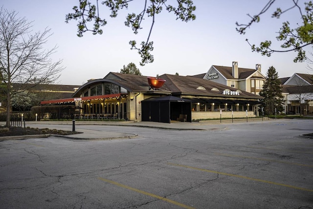 exterior space with uncovered parking