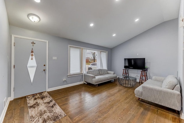 living area with baseboards, wood finished floors, vaulted ceiling, and recessed lighting