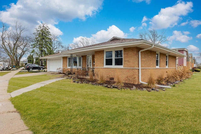 single story home with driveway, brick siding, a garage, and a front lawn