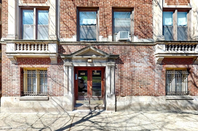 5110 S Woodlawn Ave Unit 2H, Chicago, IL 60615 - doorway to property featuring brick siding and french doors