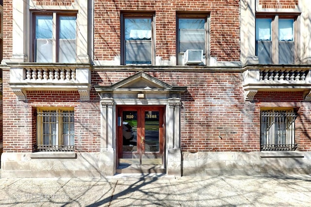 5110 S Woodlawn Ave Unit 2H, Chicago, IL 60615 - property entrance featuring brick siding and french doors