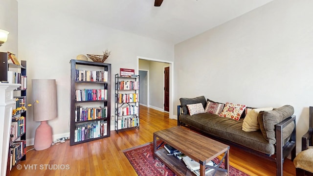 5110 S Woodlawn Ave Unit 2H, Chicago, IL 60615 - living room featuring baseboards, a ceiling fan, and wood finished floors