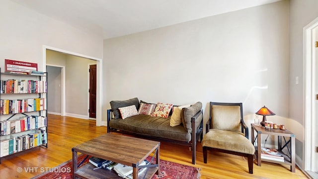 5110 S Woodlawn Ave Unit 2H, Chicago, IL 60615 - living room with baseboards and wood finished floors