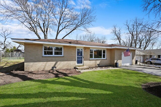 ranch-style home with aphalt driveway, fence, a front lawn, brick siding, and an attached garage