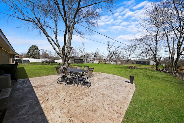 view of patio with an outdoor fire pit and a fenced backyard