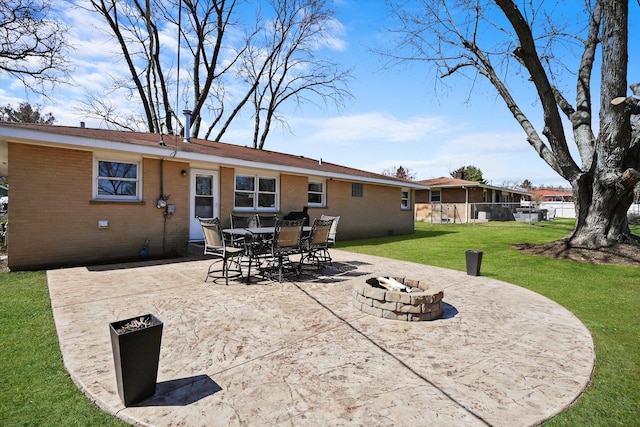 view of patio / terrace featuring a fire pit