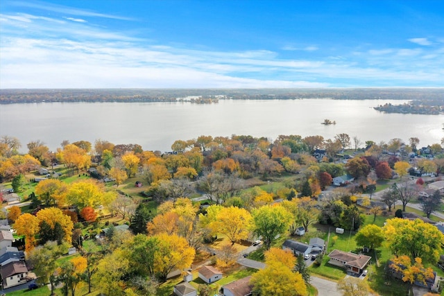 aerial view with a residential view and a water view