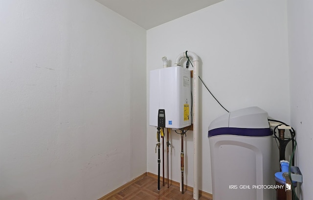 details with tankless water heater and baseboards