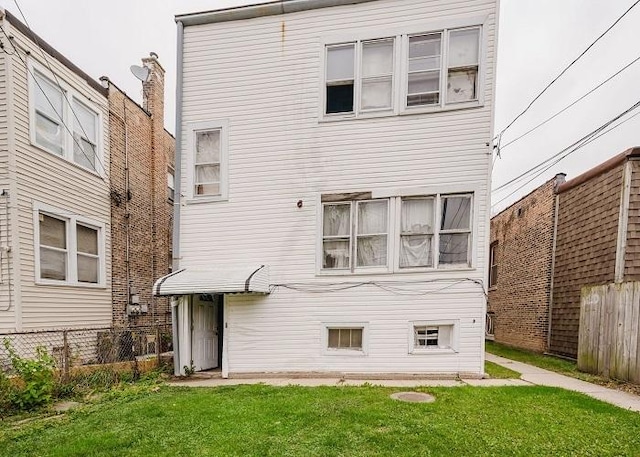 1228 S 59th Ave, Cicero, IL 60804 - back of property featuring fence and a yard