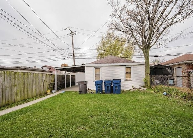 1228 S 59th Ave, Cicero, IL 60804 - view of yard featuring fence and a carport