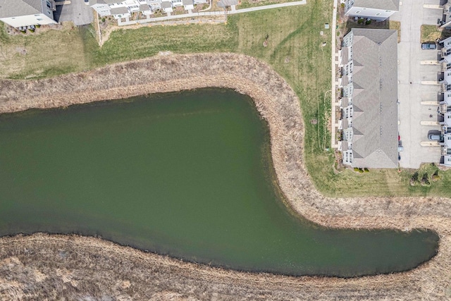 bird's eye view with a residential view and a water view