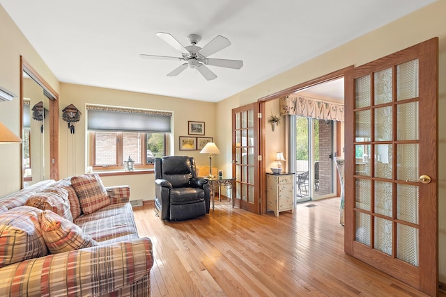 5 Saint Moritz Dr Unit 101, Palos Park, IL 60464 - living room with healthy amount of natural light, light wood-style flooring, ceiling fan, and baseboards