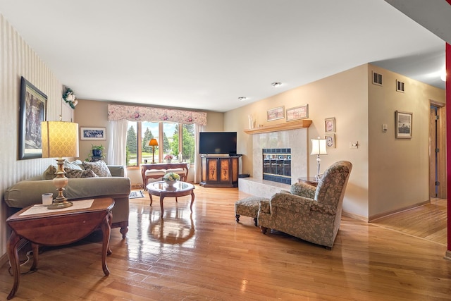 5 Saint Moritz Dr Unit 101, Palos Park, IL 60464 - living room with light wood-type flooring, a fireplace, and baseboards