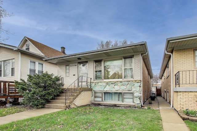 view of front of house with brick siding
