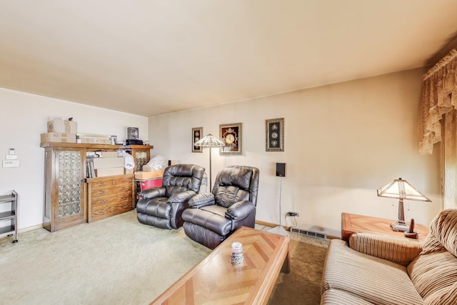 living room with carpet flooring, baseboards, and visible vents