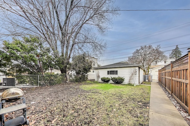 view of yard featuring a fenced backyard