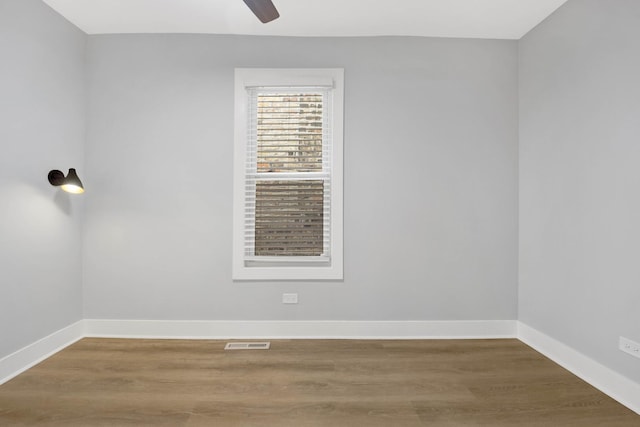 2134 W Shakespeare Ave, Chicago, IL 60647 - empty room with wood finished floors, baseboards, ceiling fan, and visible vents