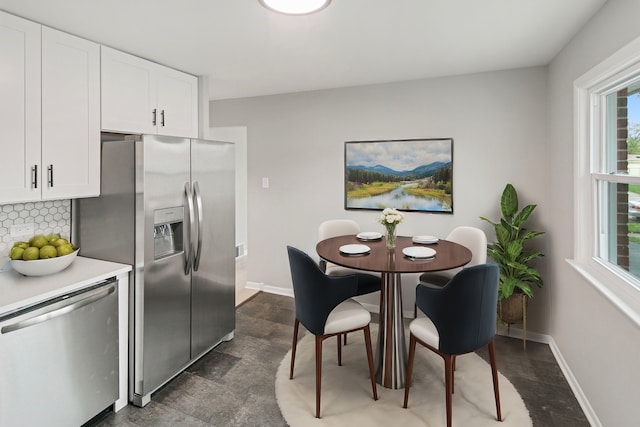 150 Serena Dr, Chicago Heights, IL 60411 - dining space featuring baseboards