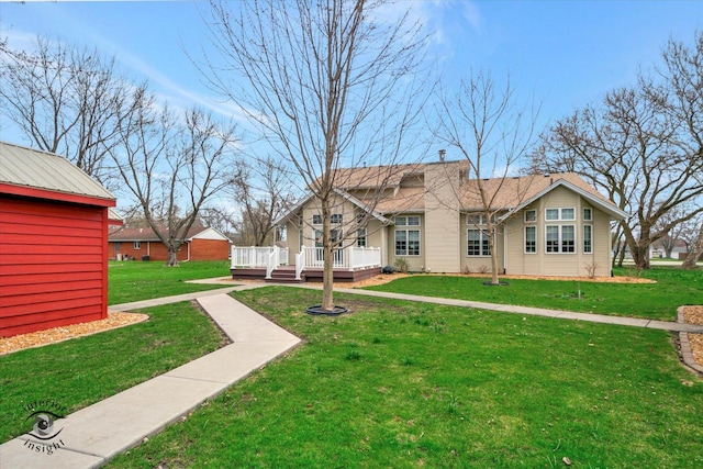 274 N School St, Braidwood, IL 60408 - view of front of home featuring a front yard and a deck