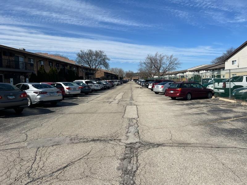 view of uncovered parking lot