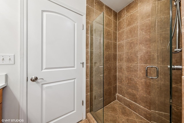bathroom with a stall shower