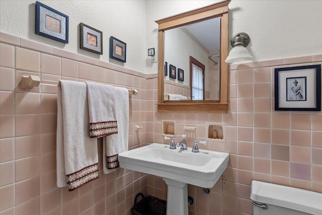 215 Prospect Ave, Highland Park, IL 60035 - bathroom with toilet and tile walls