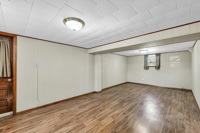 1618 Carolina Dr, Rantoul, IL 61866 - below grade area featuring wood finished floors and baseboards