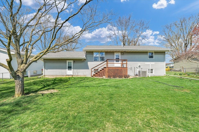 1618 Carolina Dr, Rantoul, IL 61866 - rear view of property featuring a deck and a lawn