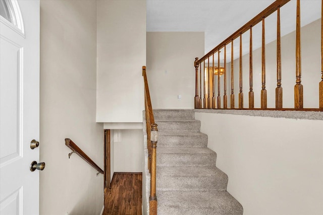 1618 Carolina Dr, Rantoul, IL 61866 - staircase with wood finished floors