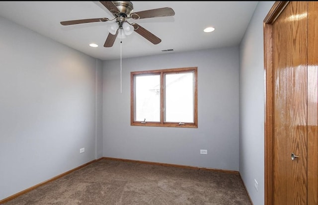 carpeted empty room featuring recessed lighting, a ceiling fan, and baseboards