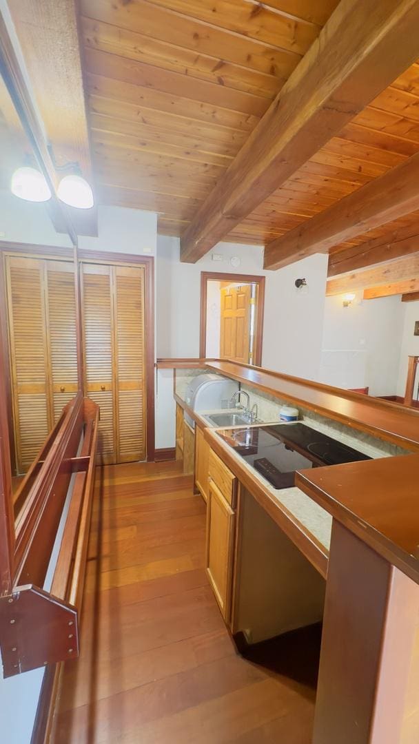 1745 W Cornelia Ave, Chicago, IL 60657 - kitchen featuring a wood ceiling with exposed beams and light wood finished floors