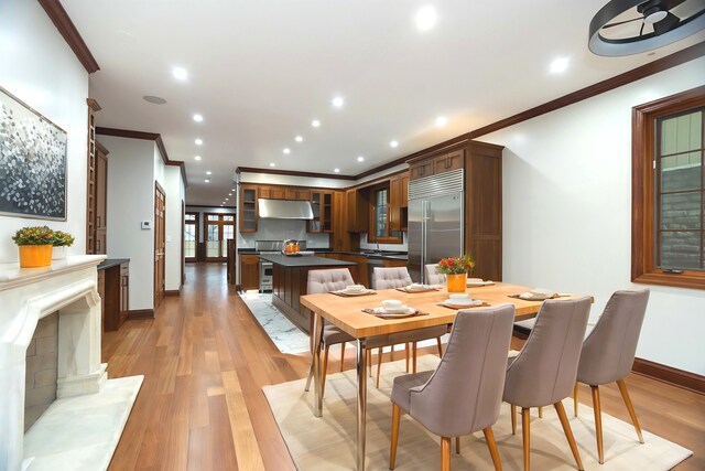 1745 W Cornelia Ave, Chicago, IL 60657 - dining space featuring crown molding, recessed lighting, and light wood-type flooring