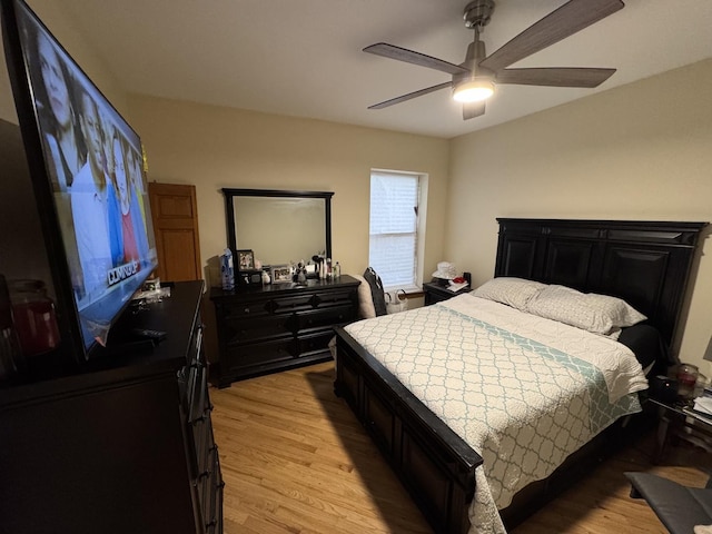5014 S Prairie Ave Unit 1, Chicago, IL 60615 - bedroom featuring light wood finished floors and ceiling fan