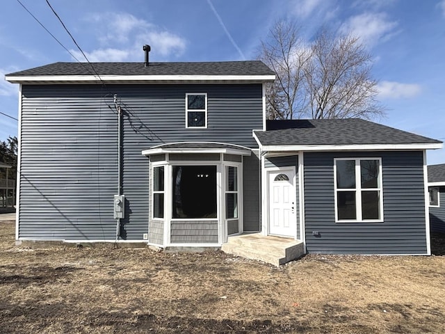 123 W N St, Creston, IL 60113 - back of property featuring a shingled roof
